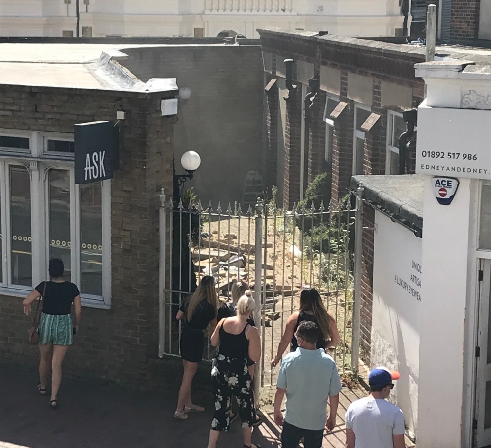 Town centre restaurant wall collapses